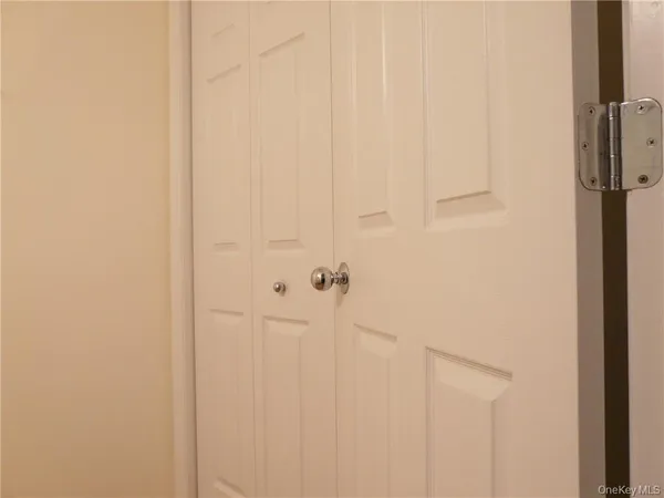 a kitchen with cabinets appliances and a sink
