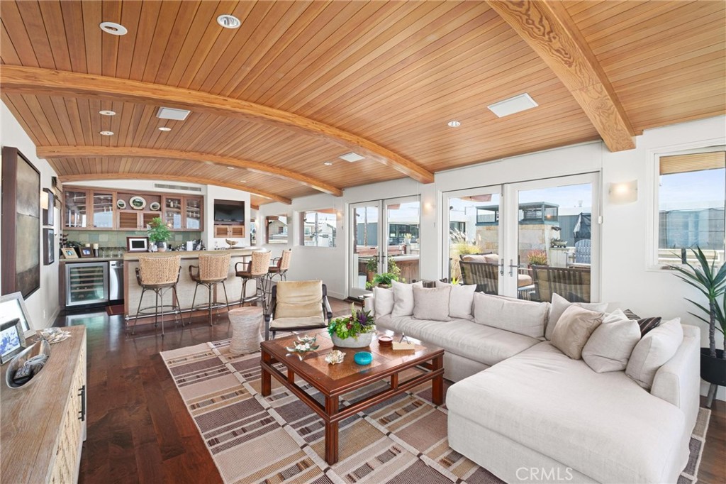 401 27th Street Manhattan Beach, CA 90266 - Photo 16 of 36 a living room with furniture and a table