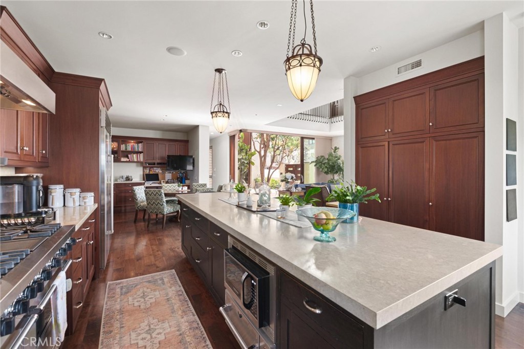 401 27th Street Manhattan Beach, CA 90266 - Photo 36 of 36 a kitchen with stainless steel appliances granite countertop a sink and a refrigerator