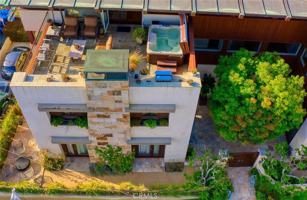 401 27th Street Manhattan Beach, CA 90266 - Photo 5 of 36 an aerial view of a house with plants and large tree