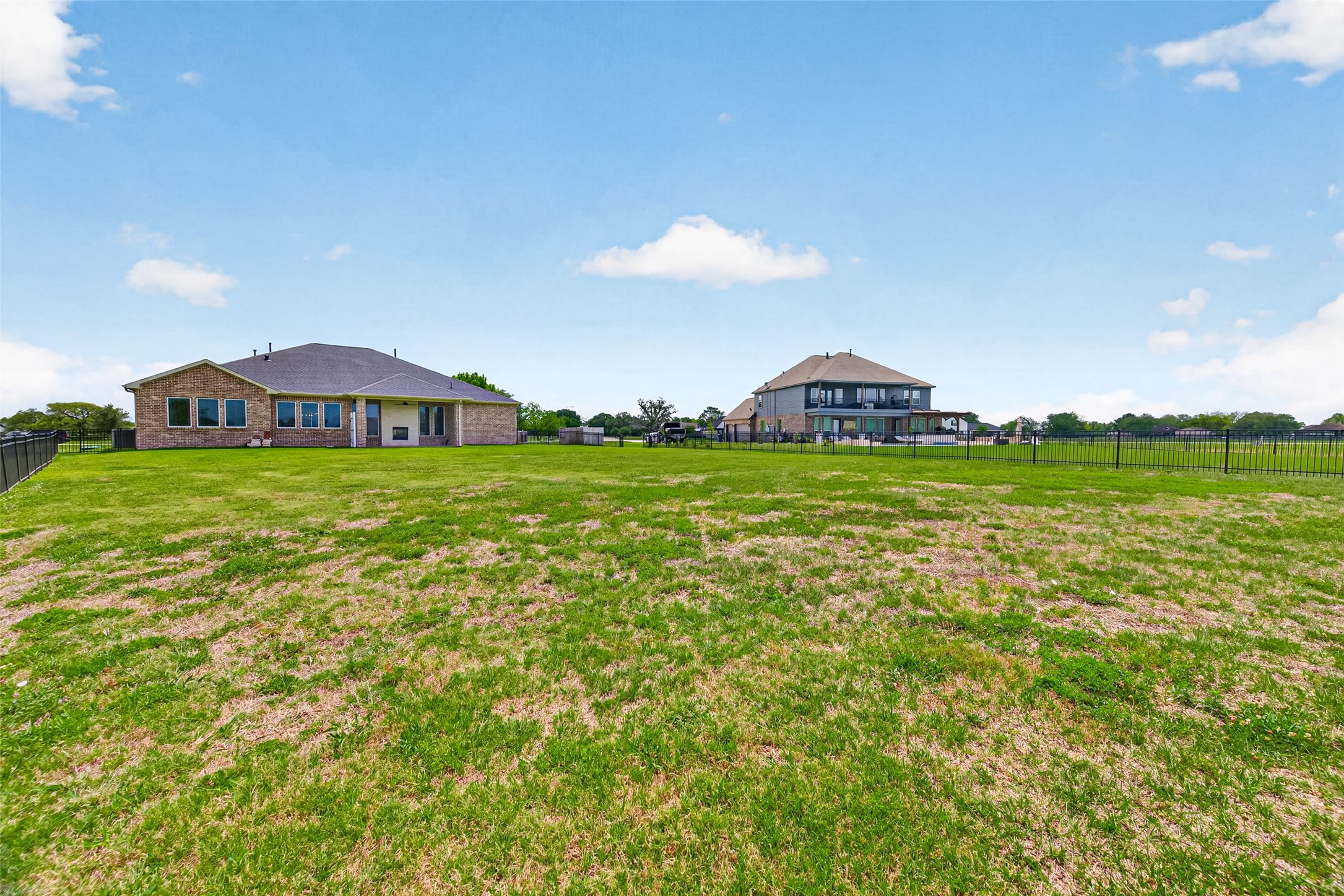 803 Lily Lane Rosharon, TX 77583 - Photo 34 of 36 View of the home from the lake