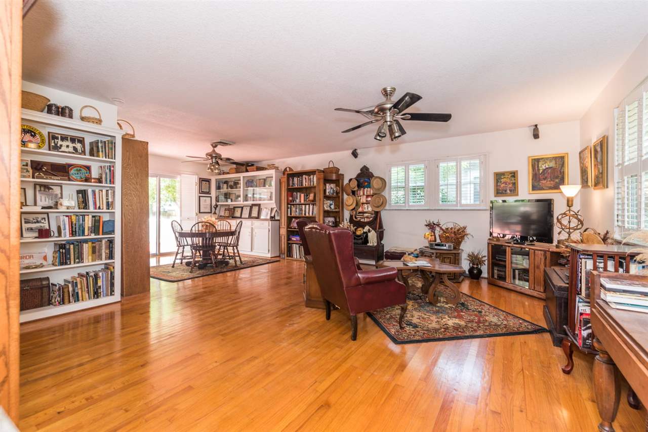 71 Valencia Street St. Augustine, FL 32084 - Photo 11 of 43 a living room with furniture and a wooden floor