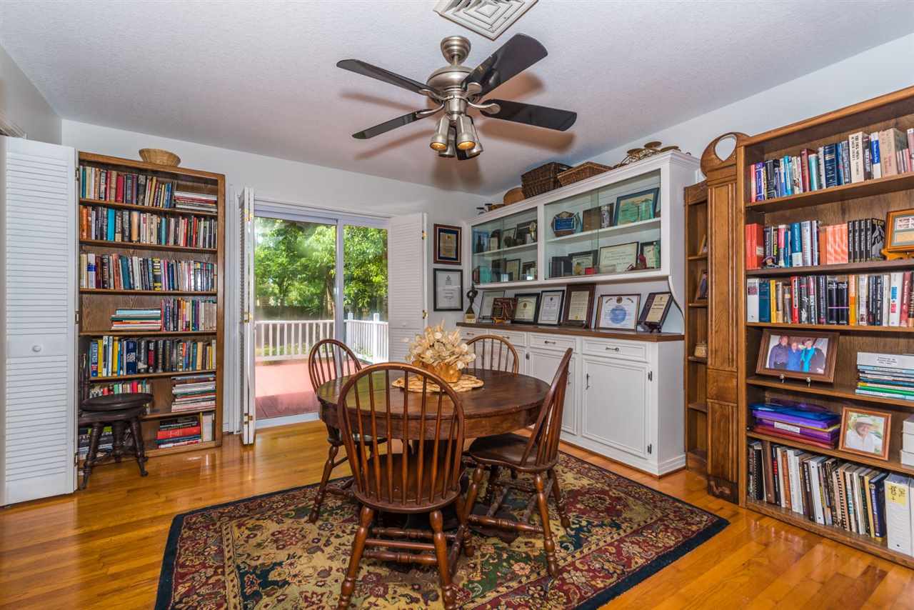 71 Valencia Street St. Augustine, FL 32084 - Photo 18 of 43 a view of a livingroom with furniture and bookshelf