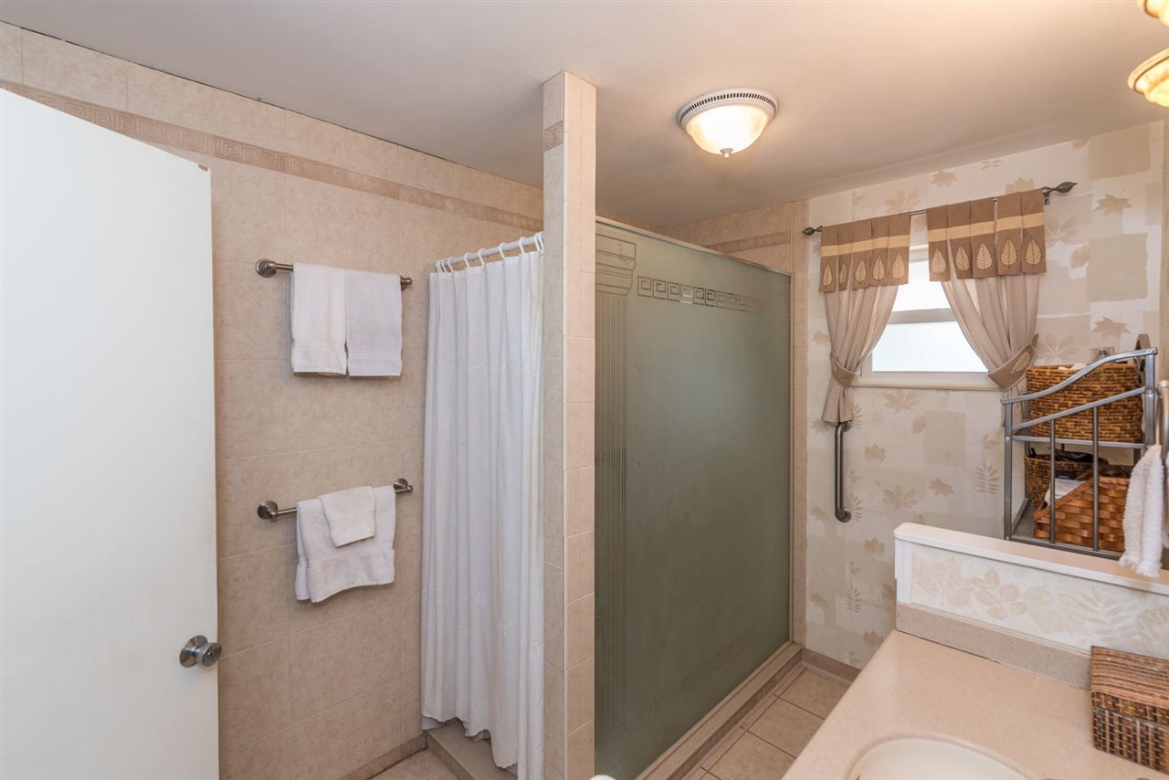 71 Valencia Street St. Augustine, FL 32084 - Photo 24 of 43 a bathroom with a sink toilet and shower