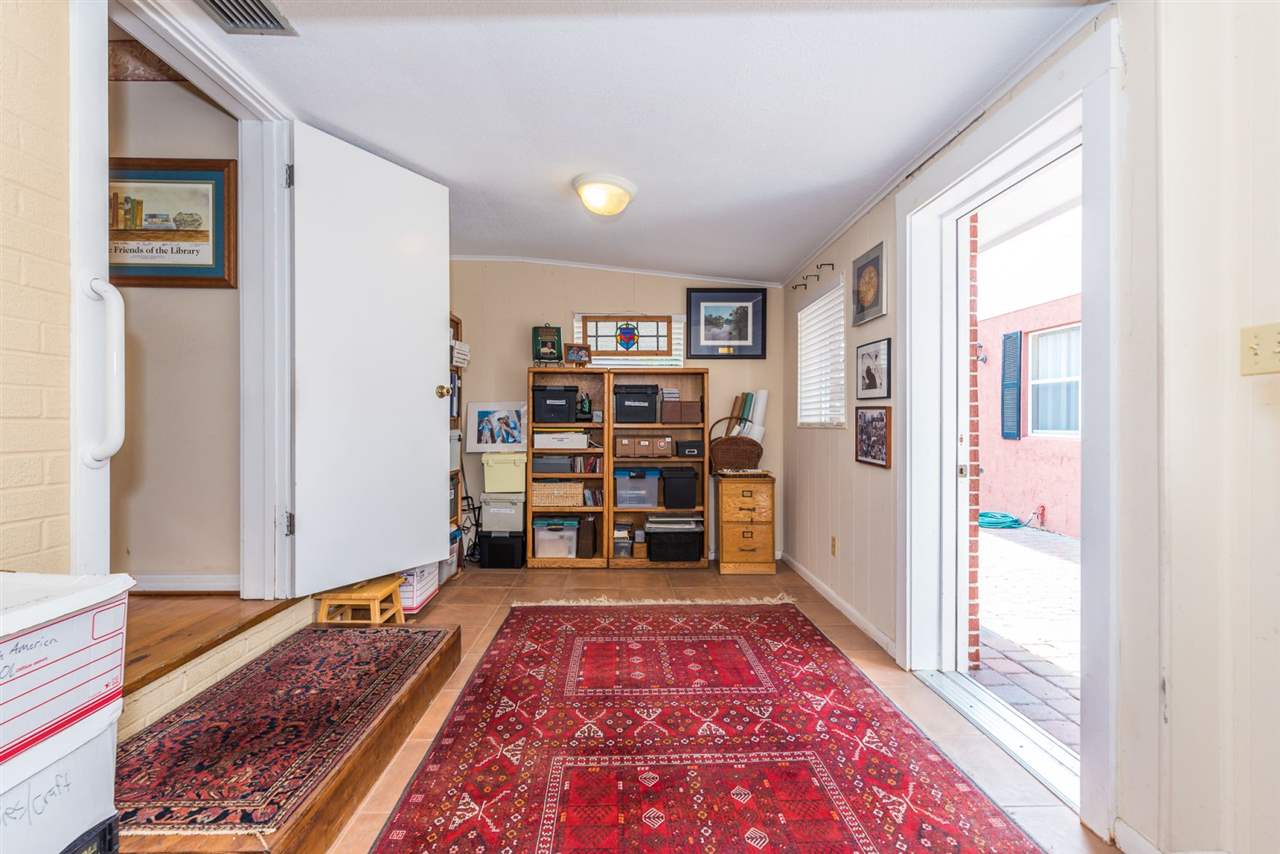 71 Valencia Street St. Augustine, FL 32084 - Photo 27 of 43 a view of a bedroom with furniture and window