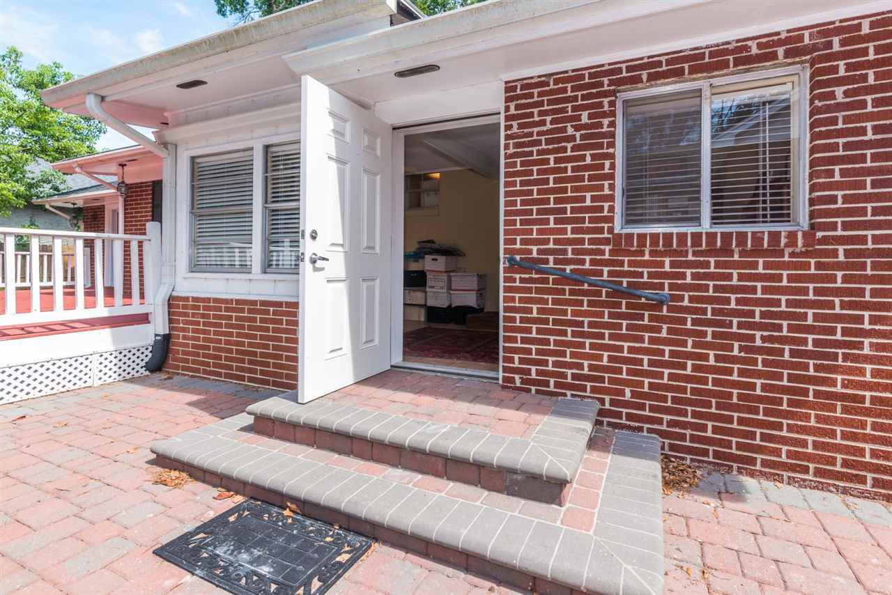 71 Valencia Street St. Augustine, FL 32084 - Photo 28 of 43 a view of a brick house with many windows
