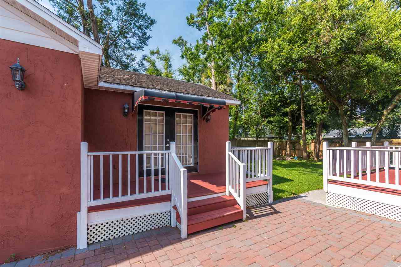 71 Valencia Street St. Augustine, FL 32084 - Photo 31 of 43 a view of a deck with a large window and wooden floor