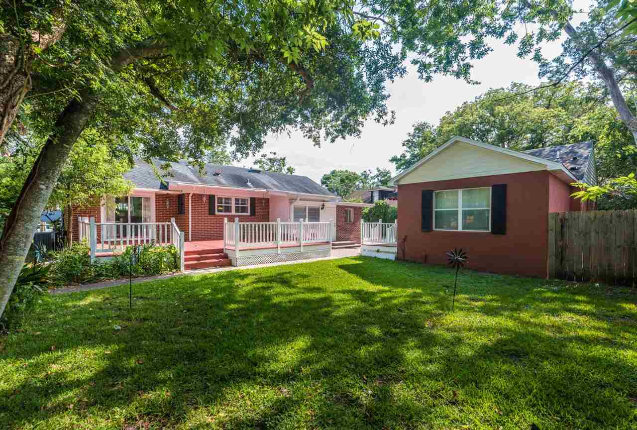 71 Valencia Street St. Augustine, FL 32084 - Photo 32 of 43 a front view of a house with yard and green space