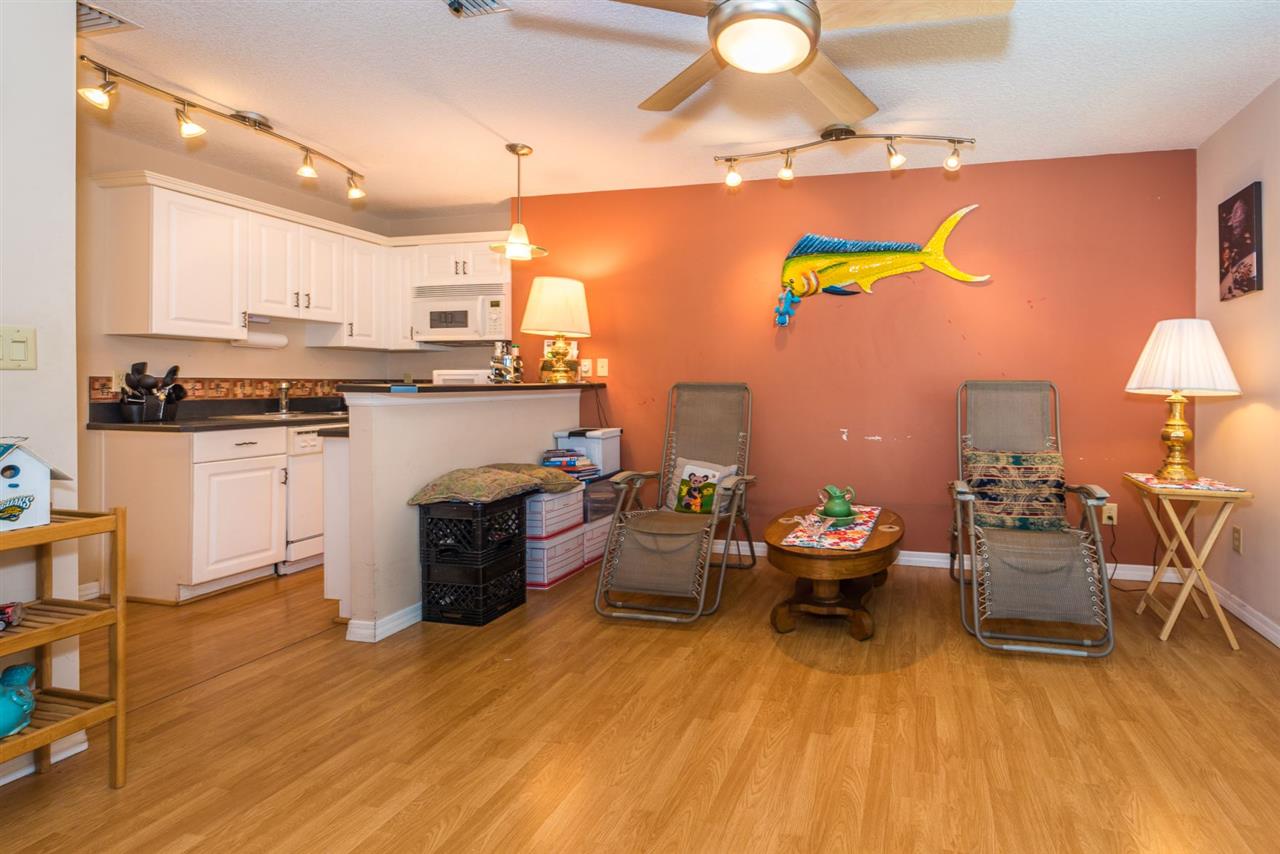 71 Valencia Street St. Augustine, FL 32084 - Photo 34 of 43 a living room with furniture and wooden floor