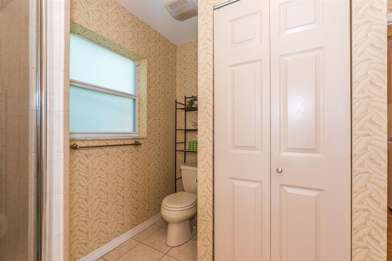 71 Valencia Street St. Augustine, FL 32084 - Photo 39 of 43 a bathroom with a toilet and a shower