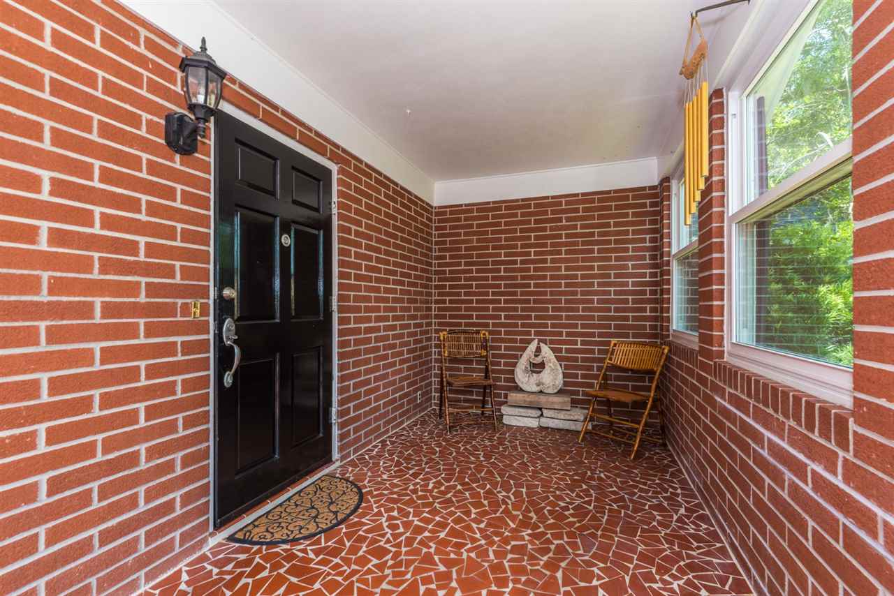 71 Valencia Street St. Augustine, FL 32084 - Photo 6 of 43 a view of a door with a chair