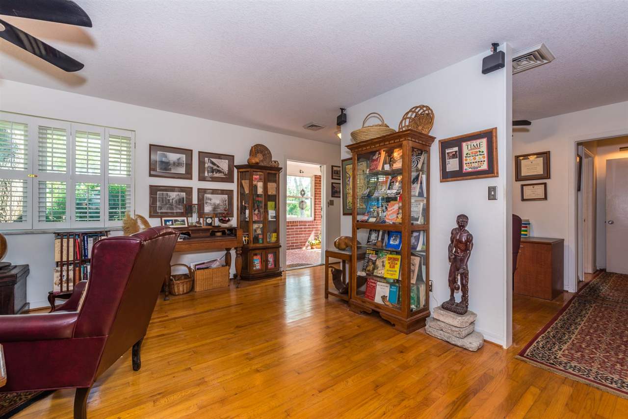 71 Valencia Street St. Augustine, FL 32084 - Photo 9 of 43 a living room with furniture and a flat screen tv