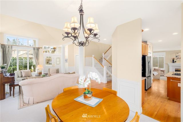 a kitchen with a sink stove and refrigerator
