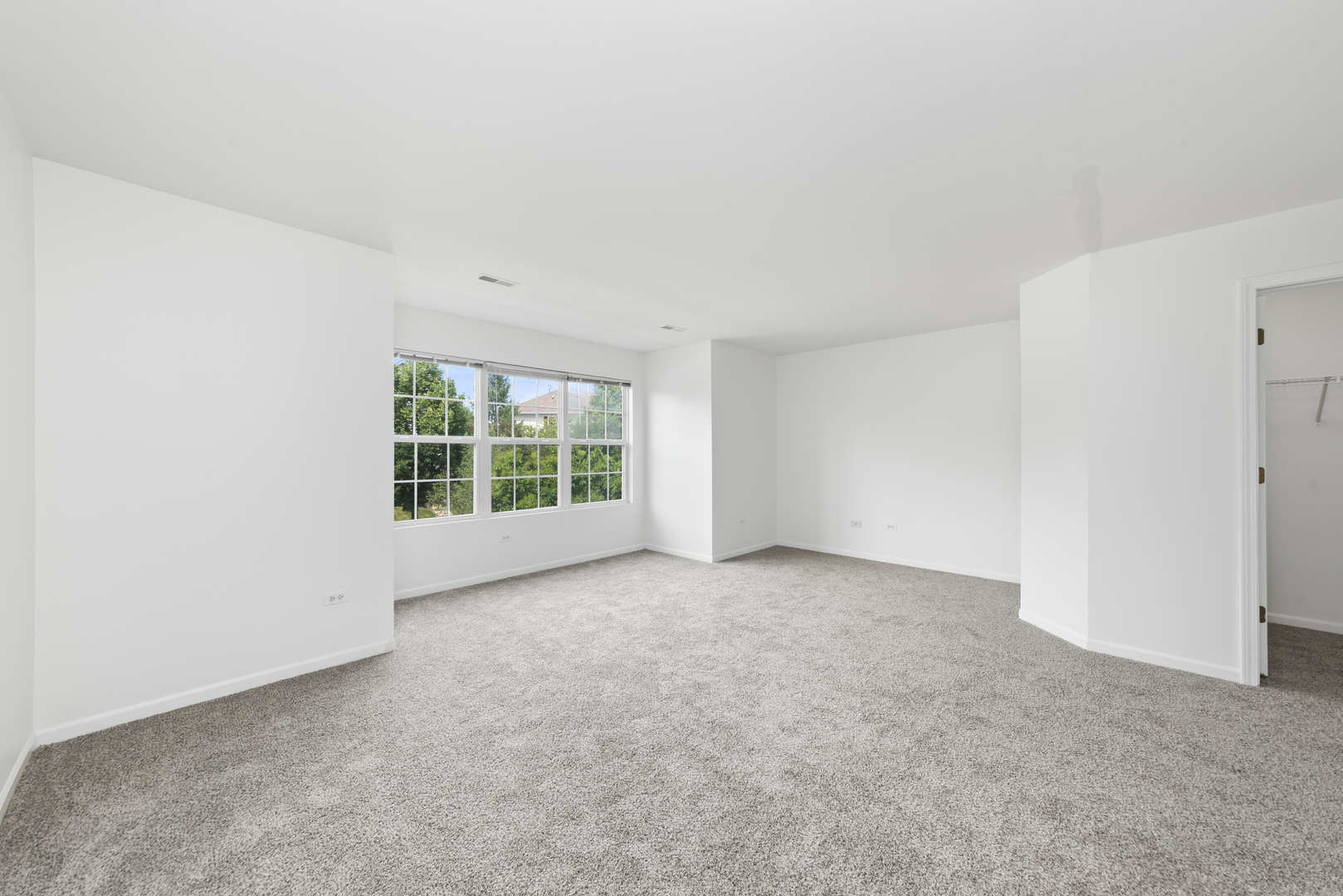 276 South Oak Creek Lane Romeoville, IL 60446 - Photo 11 of 21 a view of an empty room with a window