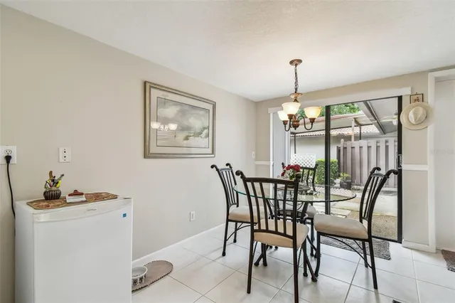 a view of dining table and chairs