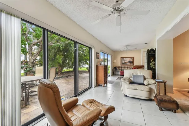 a kitchen with a sink cabinets and window