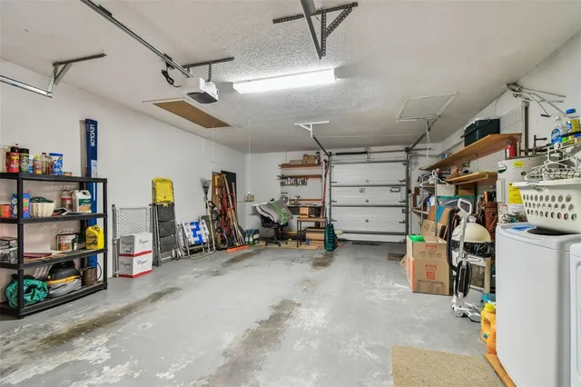 a view of a back yard of the house and front view of a house