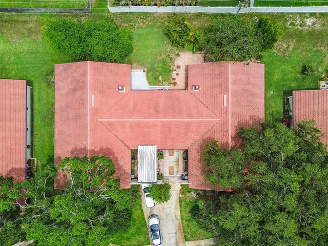 a view of a swimming pool with a lounge chairs