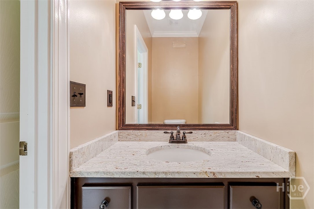 112 Hunter Lane Savannah, GA 31405 - Photo 23 of 55 Half bathroom on the main floor conveniently tucked away off the laundry room.
