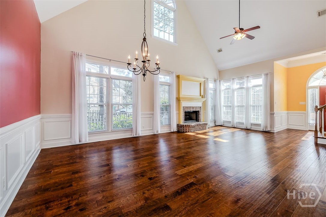 112 Hunter Lane Savannah, GA 31405 - Photo 10 of 55 This living space with dining area is full of natural light with the cathedral ceiling and many windows.