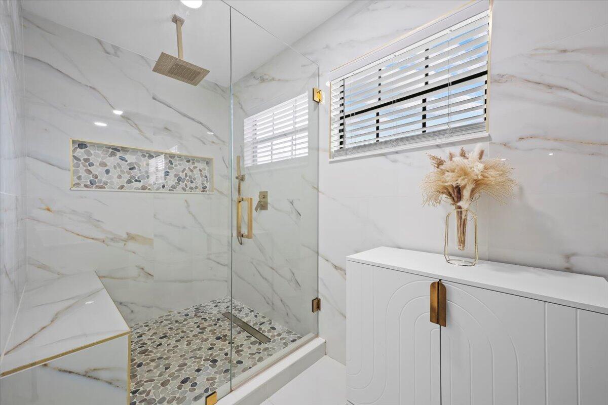 1779 Harborside Circle Wellington, FL 33414 - Photo 15 of 23 a bathroom with a shower