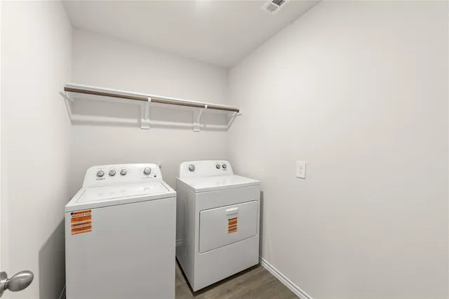 a utility room with dryer and washer