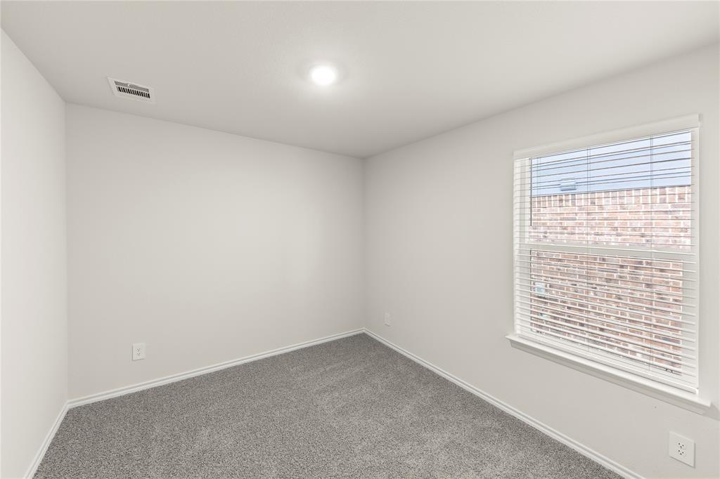 3420 Rendezvous Way Sherman, TX 75090 - Photo 6 of 13 an empty room with a window