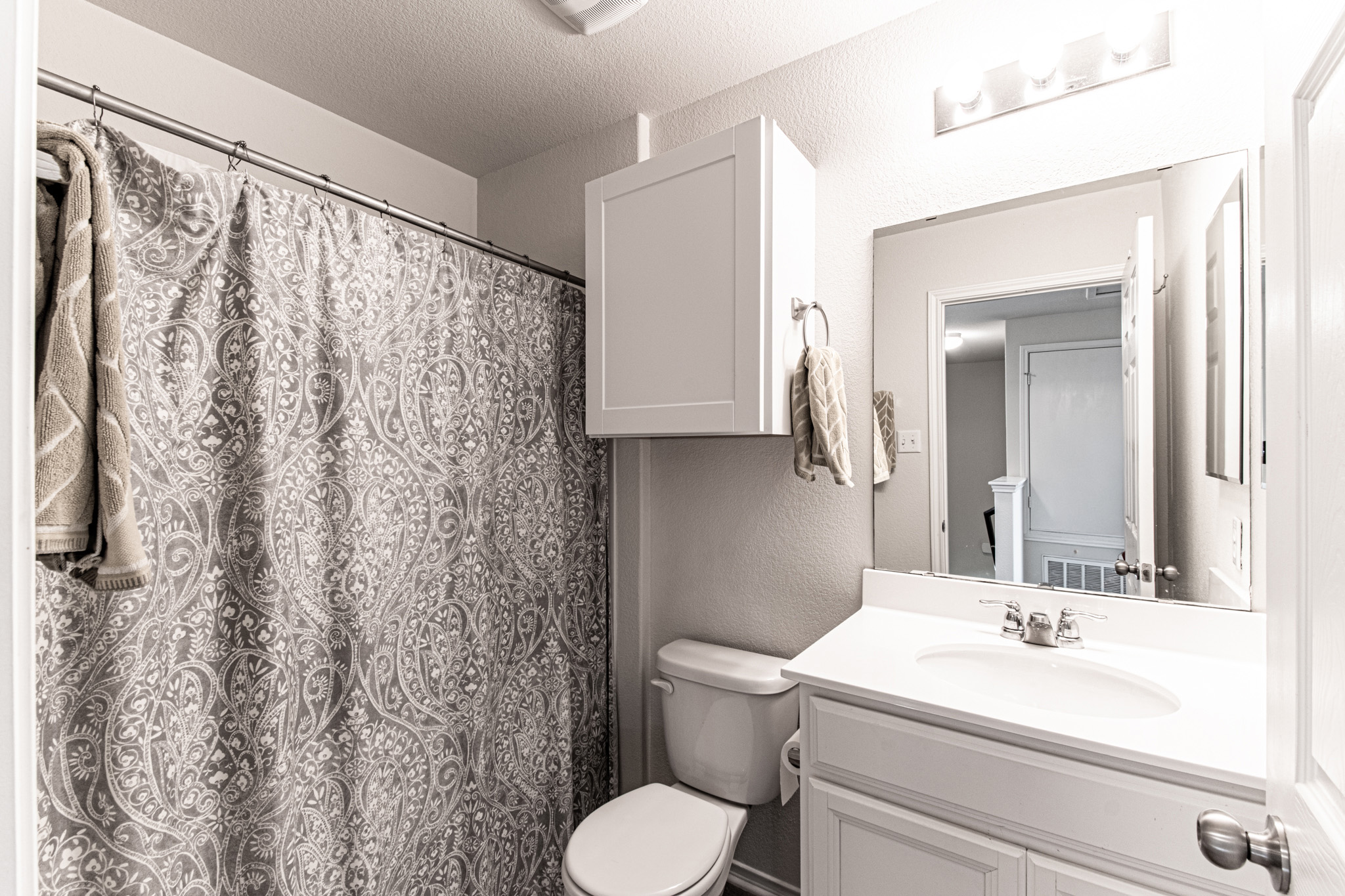 192 Spotted Rail Ridge Leander, TX 78641 - Photo 21 of 34 a bathroom with a sink toilet and shower