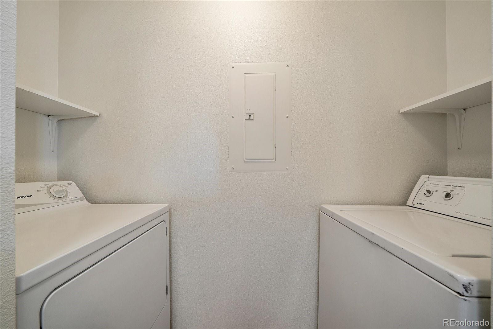 2226 West Elizabeth Street, Unit D302 Fort Collins, CO 80521 - Photo 14 of 20 a utility room with dryer and washer
