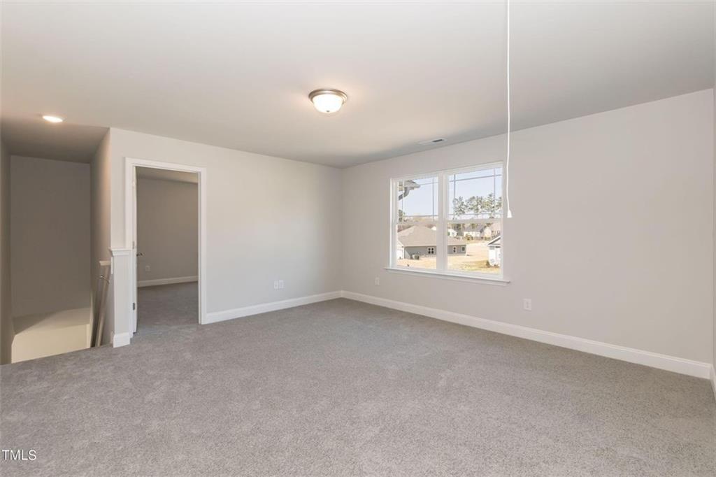 654 Bald Ridge Circle Demorest, GA 30535 - Photo 13 of 22 an empty room with windows and closet