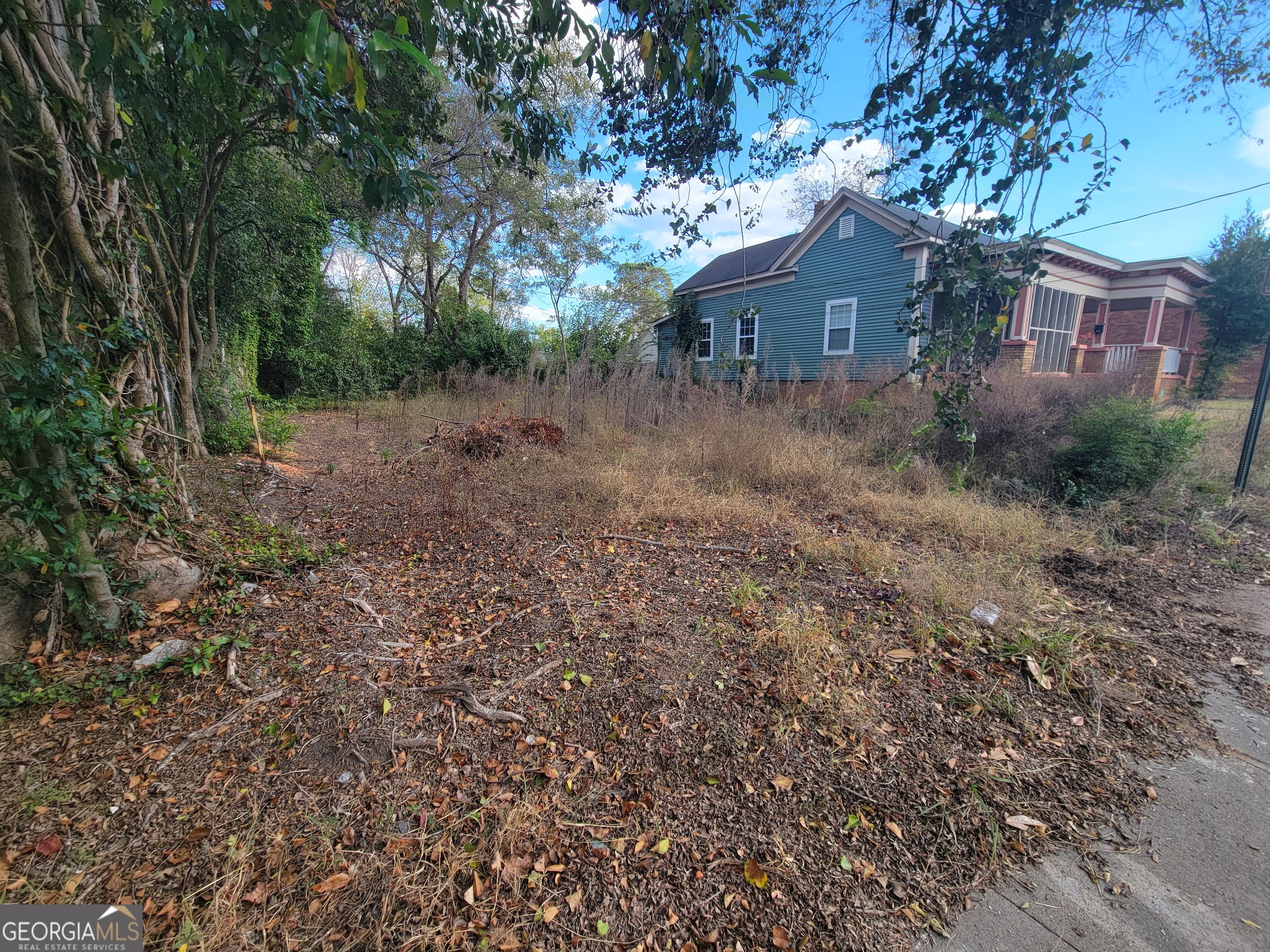 2382 2nd Street Macon, GA 31206 - Photo 1 of 4 a view of a house with a yard