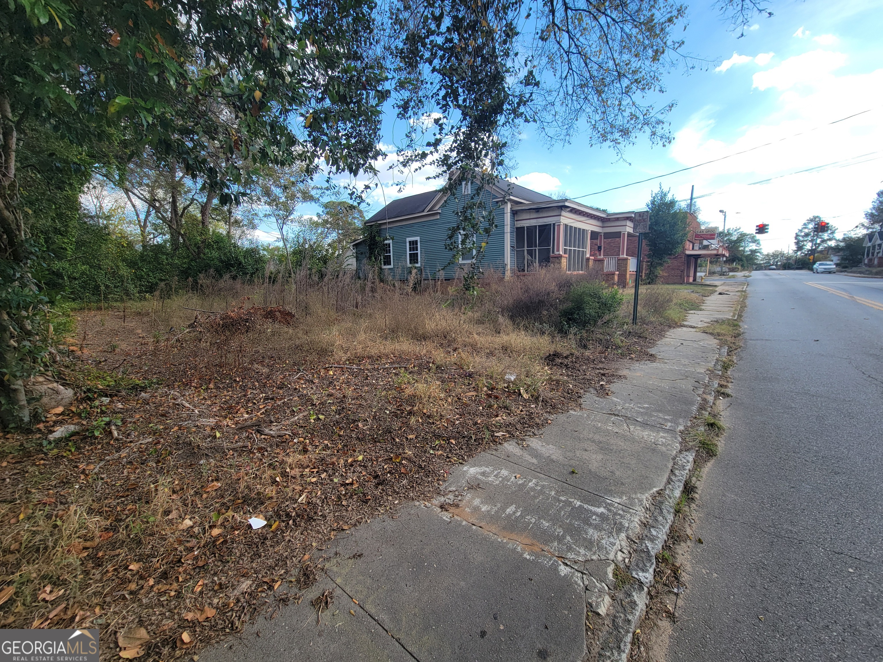 2382 2nd Street Macon, GA 31206 - Photo 3 of 4 a view of a house with a yard