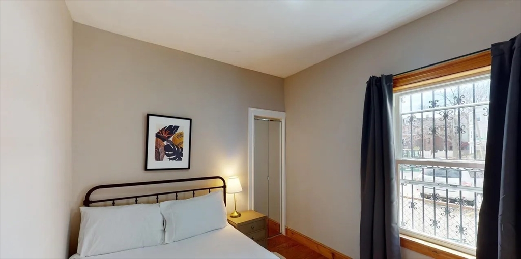 6 Cawfield Street, Unit 3 Boston, MA 02125 - Photo 5 of 9 a view of room with window and furniture