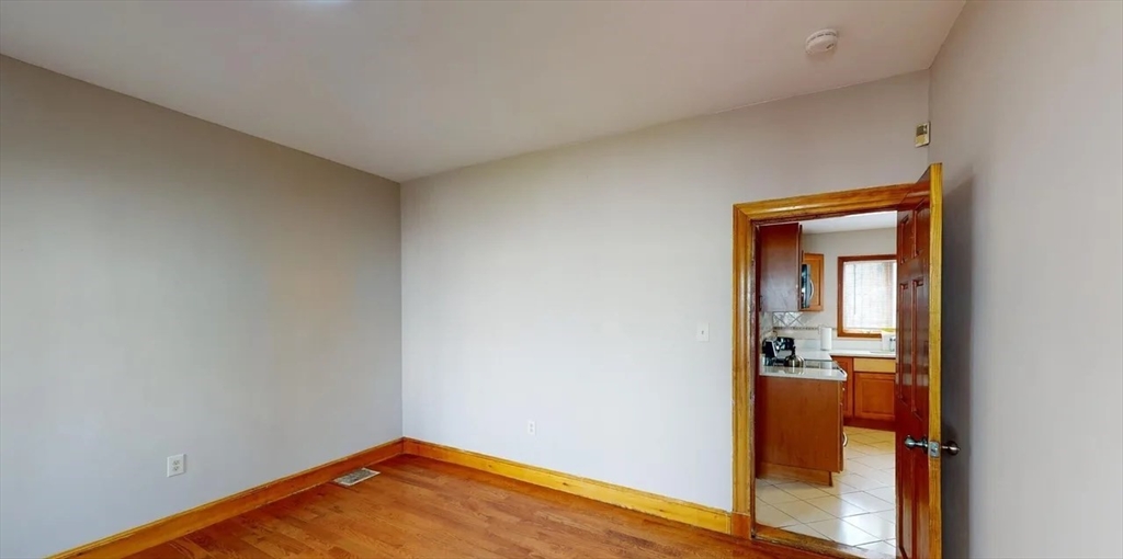 6 Cawfield Street, Unit 3 Boston, MA 02125 - Photo 6 of 9 a view of a room that has a bench in it