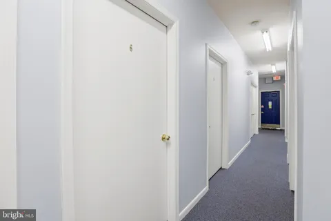 a small space with a white wall