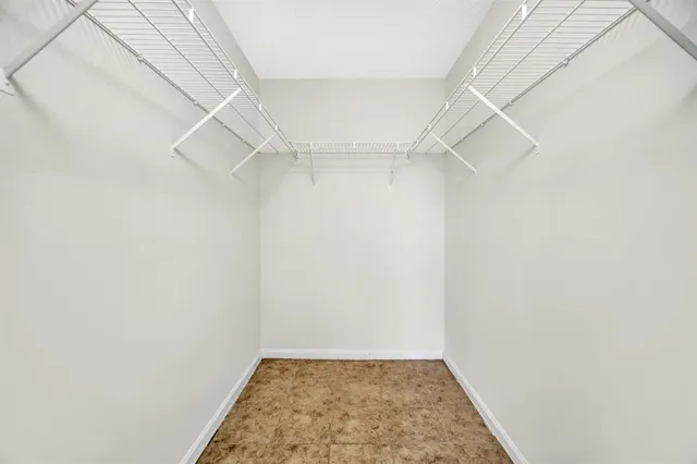 a view of a room with racks on the wall