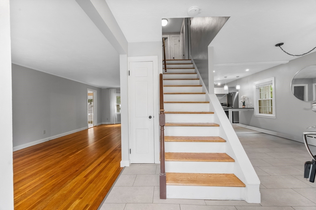 36 Melrose Street Worcester, MA 01605 - Photo 6 of 32 a view of entryway and hall with wooden floor