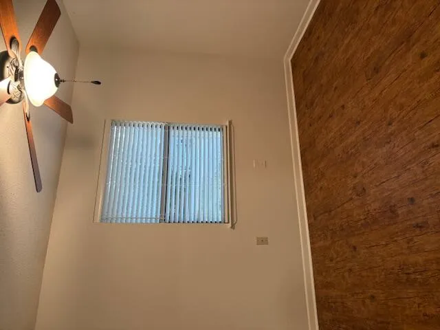 a view of a house with a tree