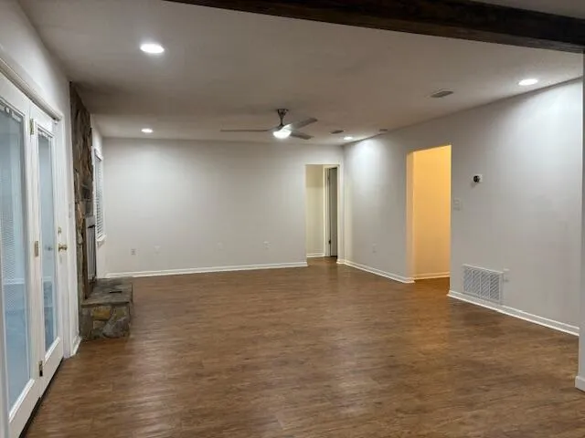 a kitchen with a refrigerator and a sink
