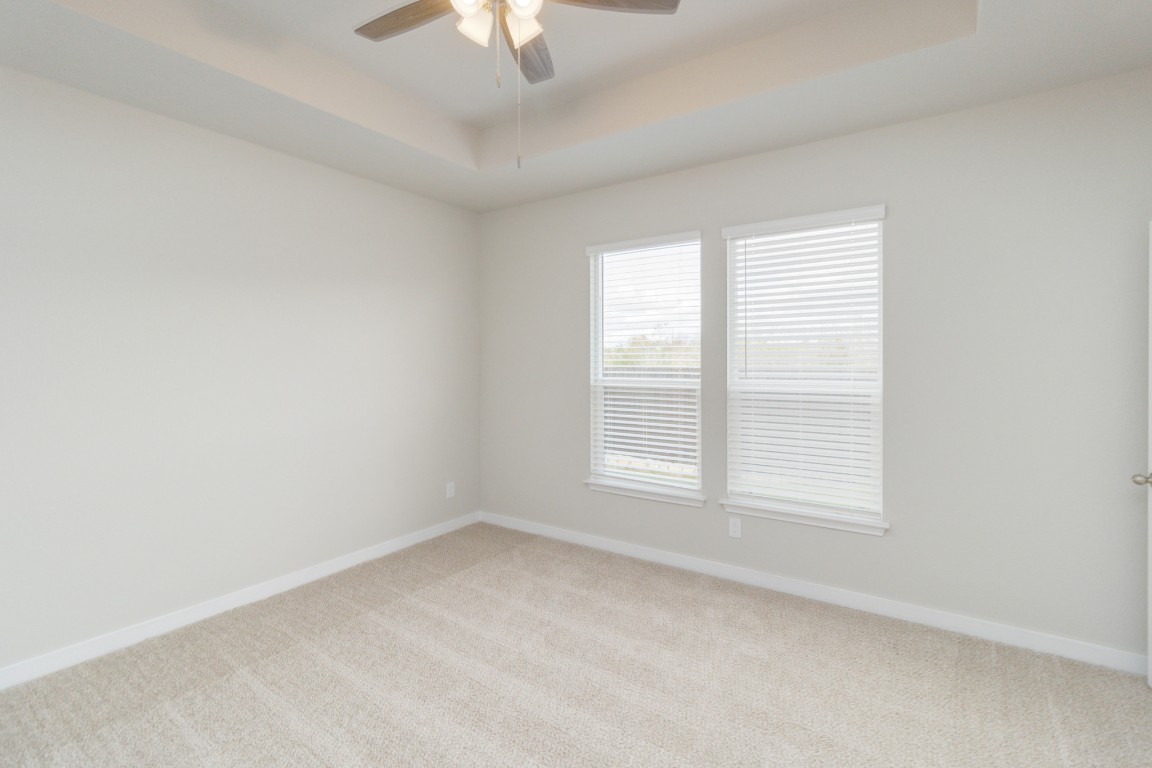 820 Staglin Street, Unit A Buda, TX 78610 - Photo 24 of 28 an empty room with a window