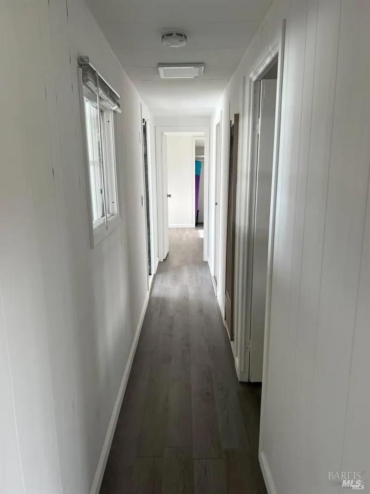 316 Pear Lane Santa Rosa, CA 95407 - Photo 9 of 17 a view of a hallway with wooden floor