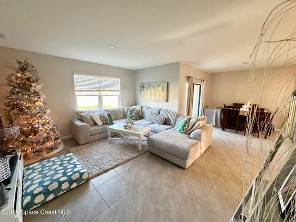 a living room with furniture and a couch