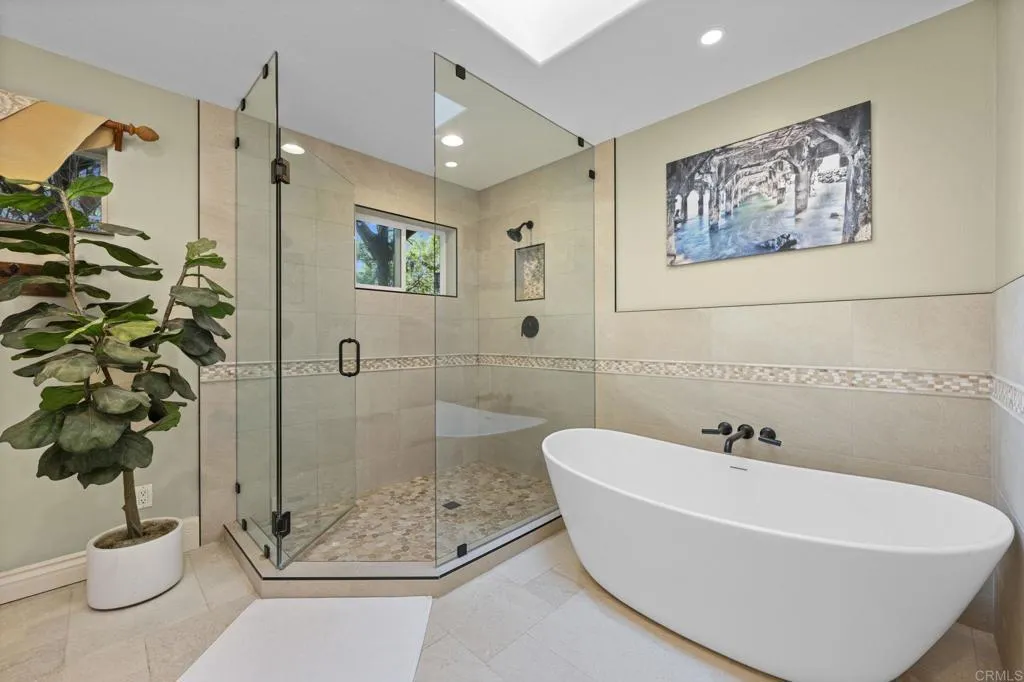 31619 Vía Puerta Del Sol Bonsall, CA 92003 - Photo 56 of 70 a white bath tub sitting next to a white sink