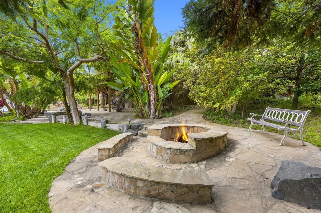 31619 Vía Puerta Del Sol Bonsall, CA 92003 - Photo 60 of 70 a view of a house with backyard and sitting area