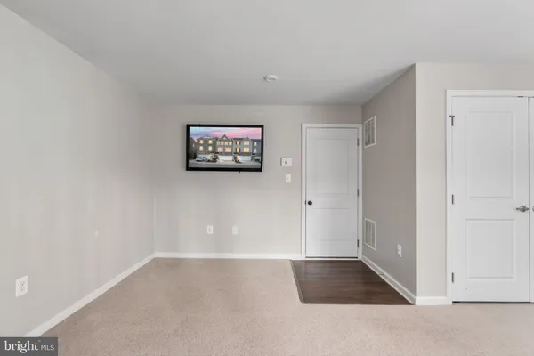 a view of hallway with a large window