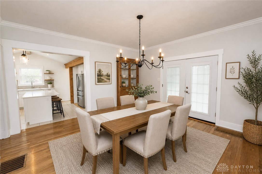 190 Swailes Road Troy, OH 45373 - Photo 15 of 82 This inviting dining room with elegant wood floors seamlessly flows into a bright, open kitchen.