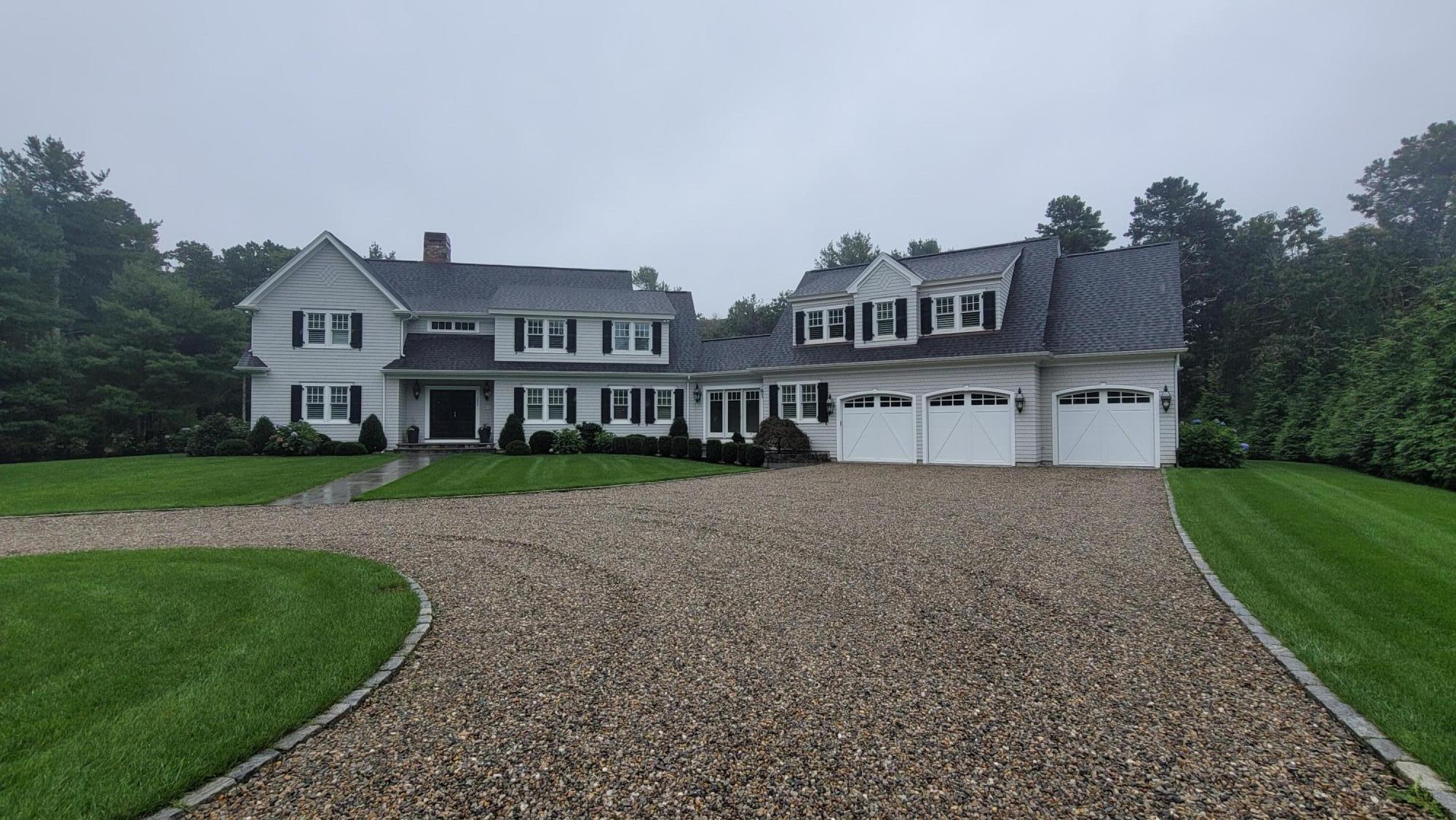 a house view with a garden space