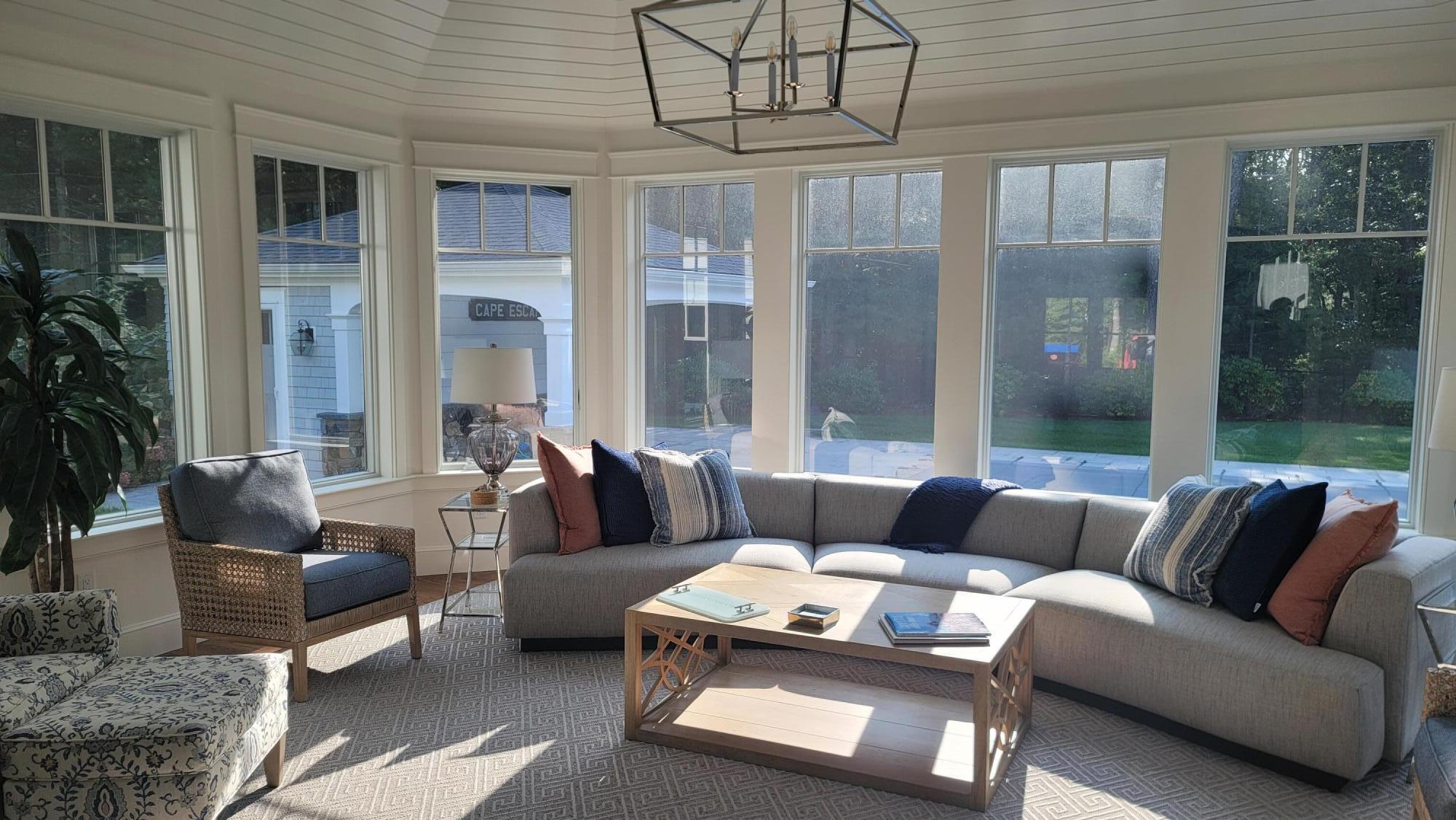 1045 Old Post Road Cotuit, MA 02635 - Photo 3 of 6 a living room with furniture and a large window