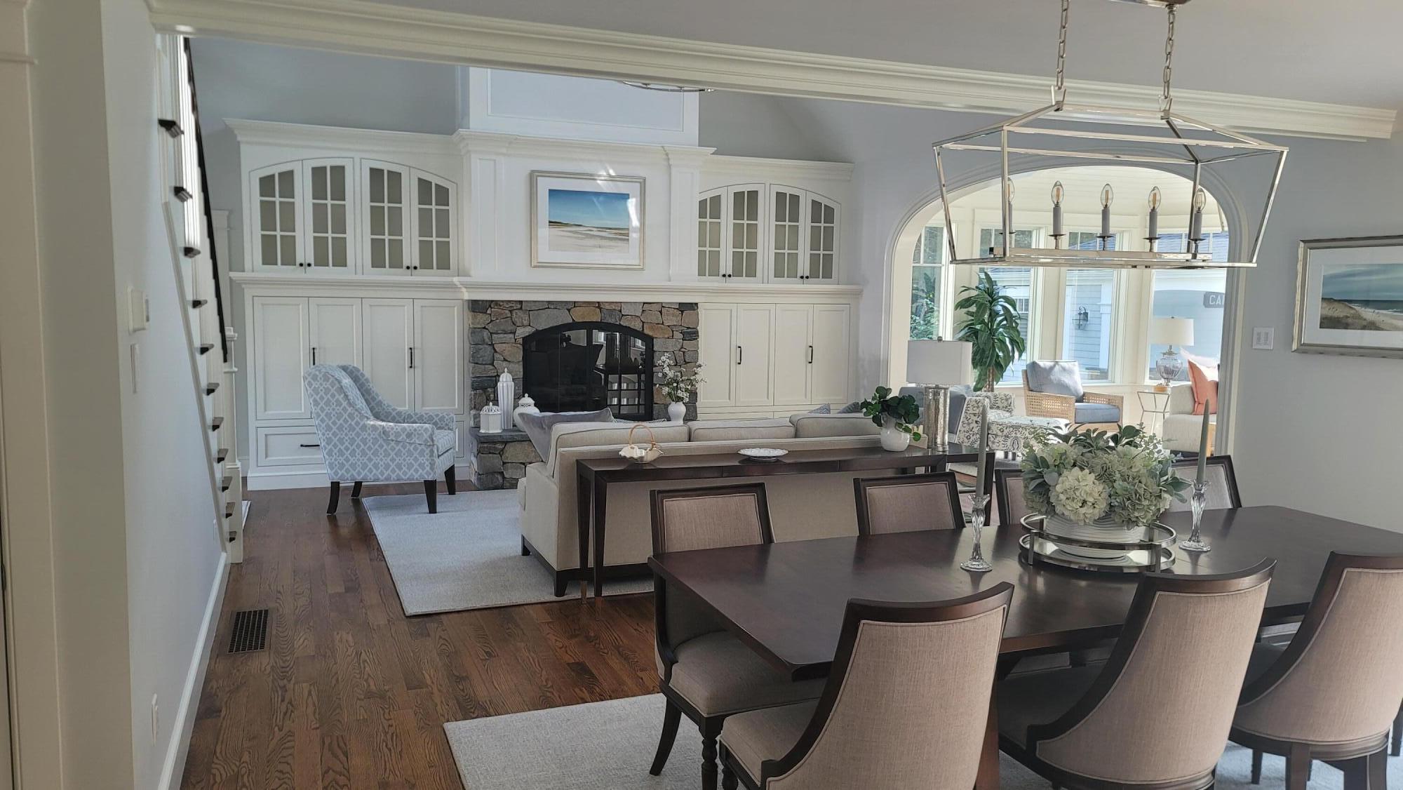 1045 Old Post Road Cotuit, MA 02635 - Photo 5 of 6 a view of a dining room with furniture window and wooden floor