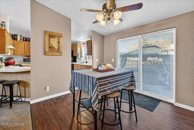 a kitchen with stainless steel appliances a refrigerator and a sink